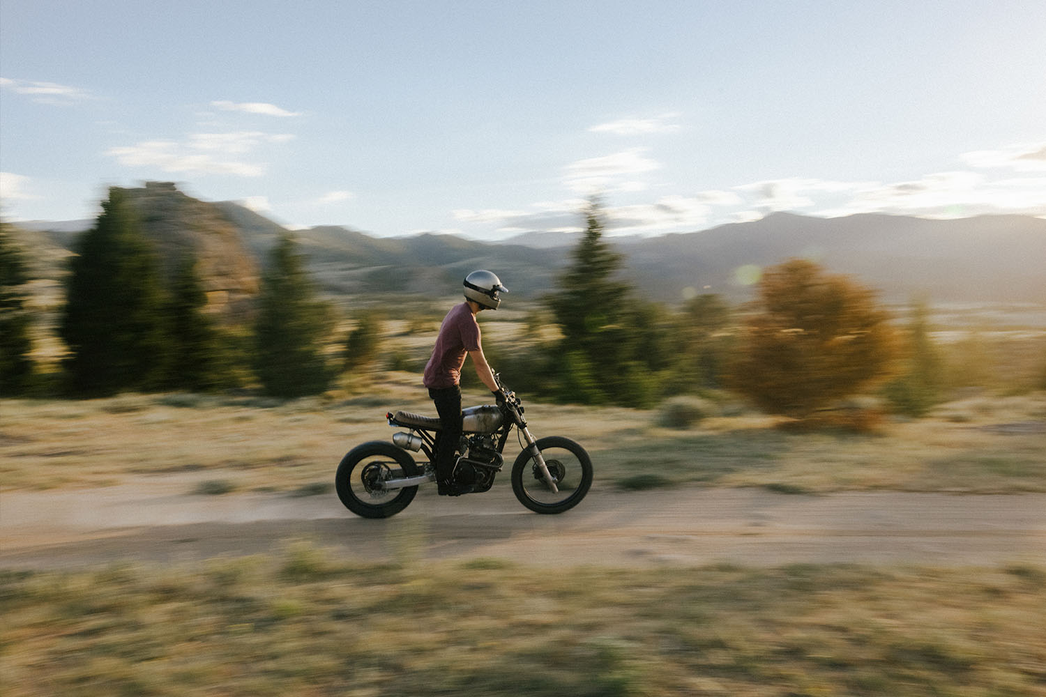 A man riding a motorcycle in Montana.