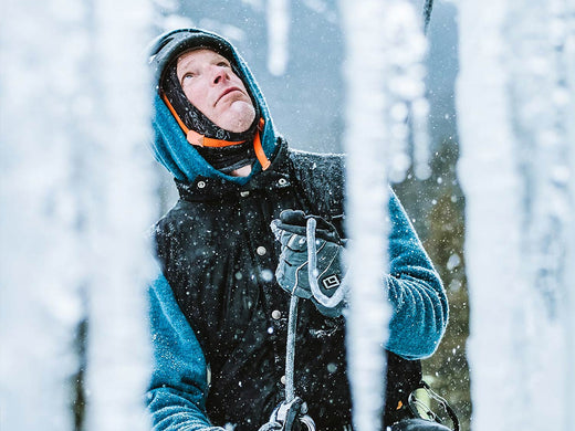 A man ice climbing.