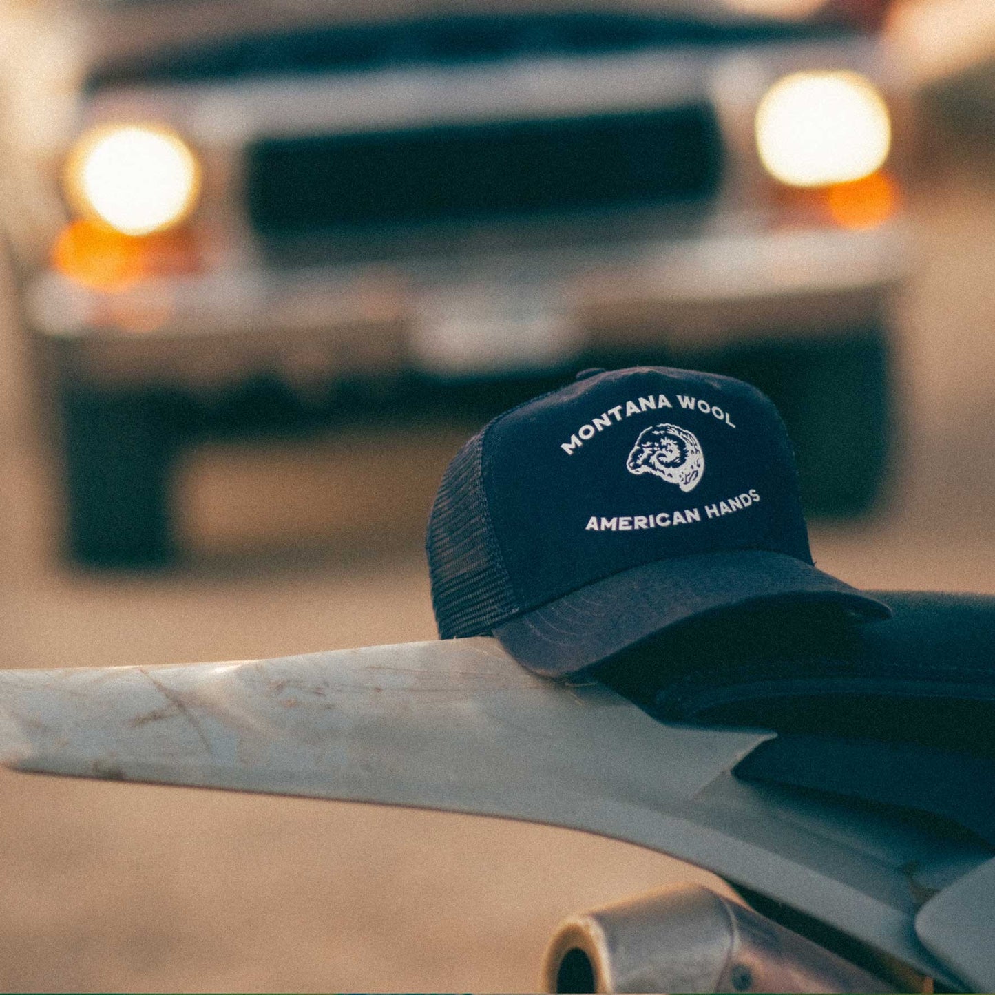 A blue American made baseball hat with a Montana logo. 