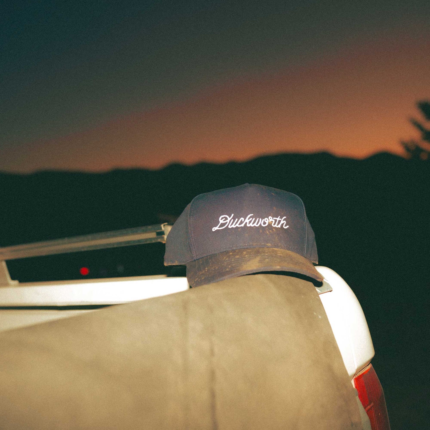 A blue American made baseball hat with a Duckworth logo. 