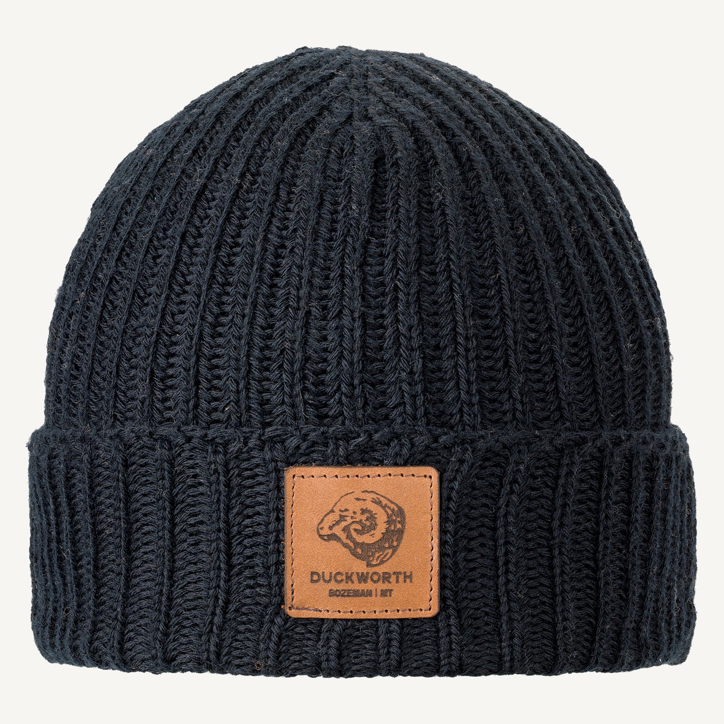 Black made in America merino wool knit hat with leather patch. 