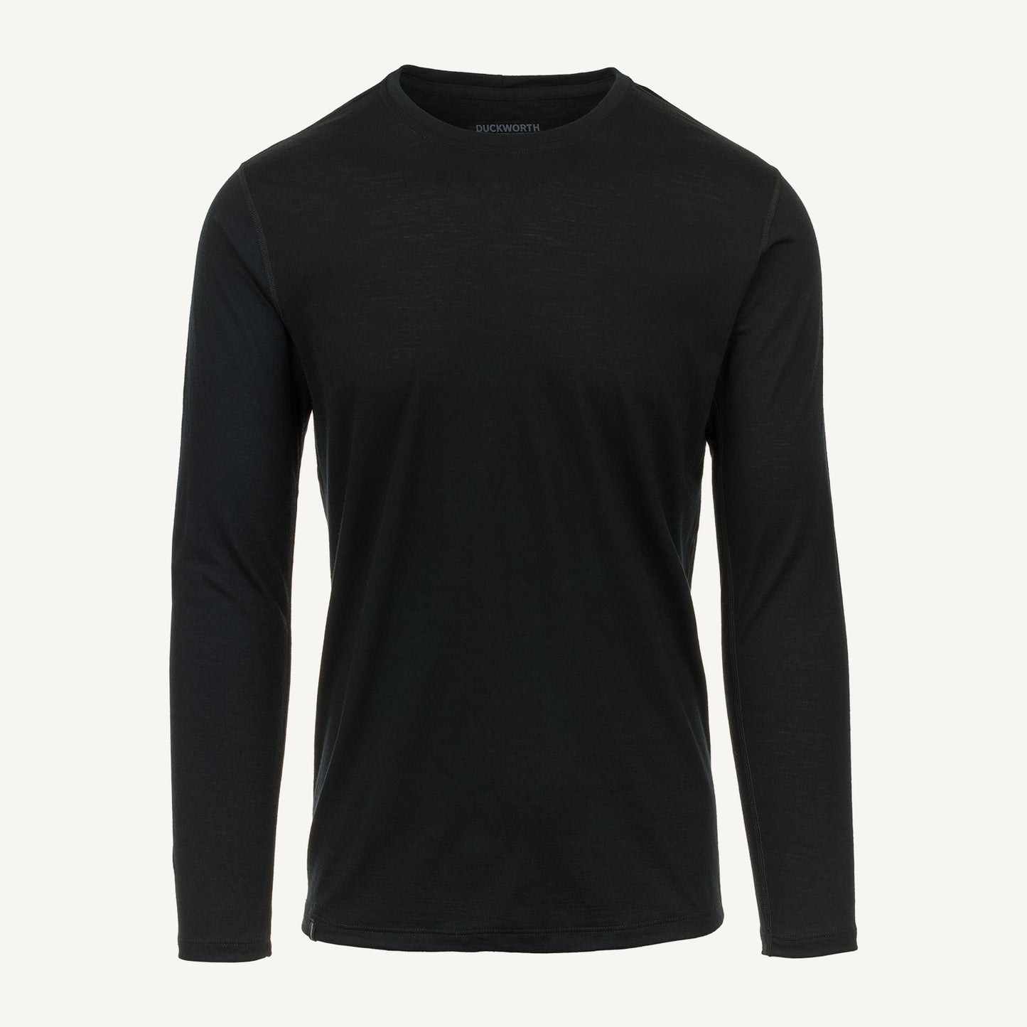 A black American made Duckworth merino wool long sleeve base layer. 