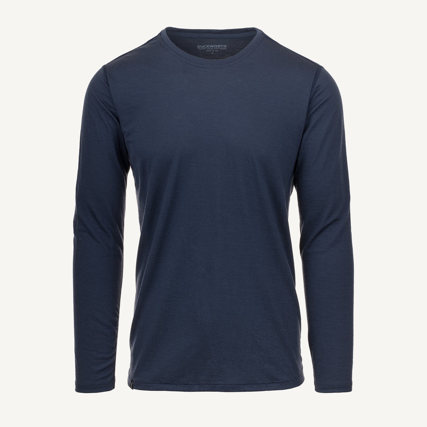 A navy American made Duckworth merino wool long sleeve base layer. 