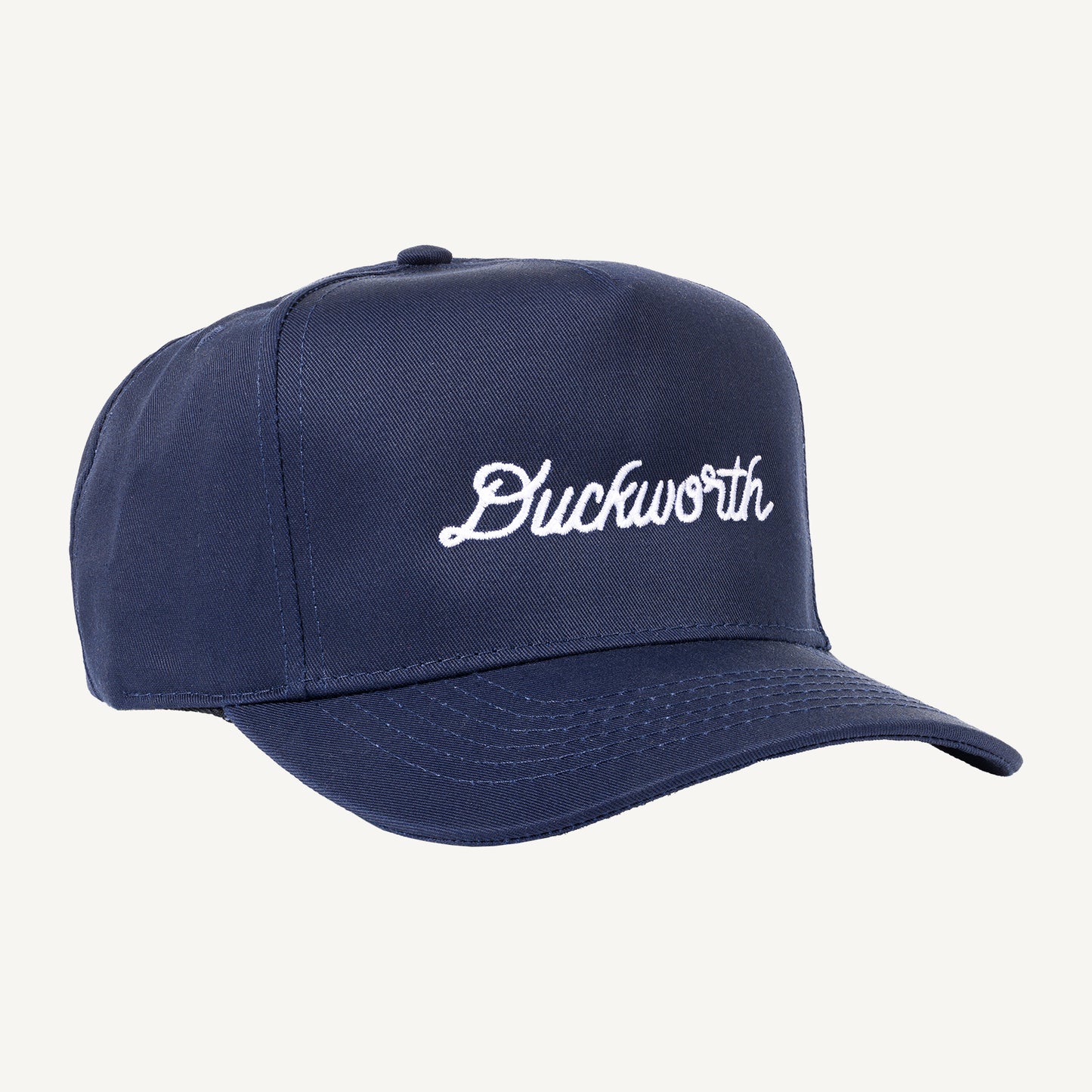 A blue American made baseball hat with a Duckworth logo. 