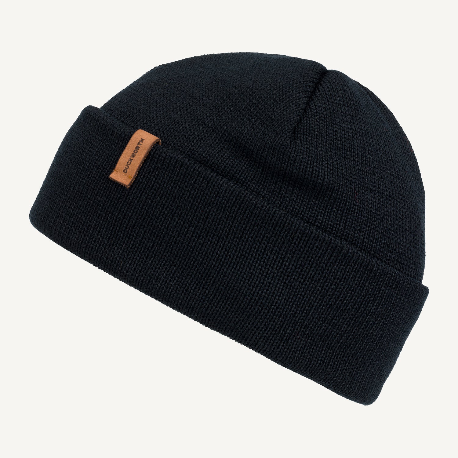 Black made in America merino wool knit hat with leather patch. 