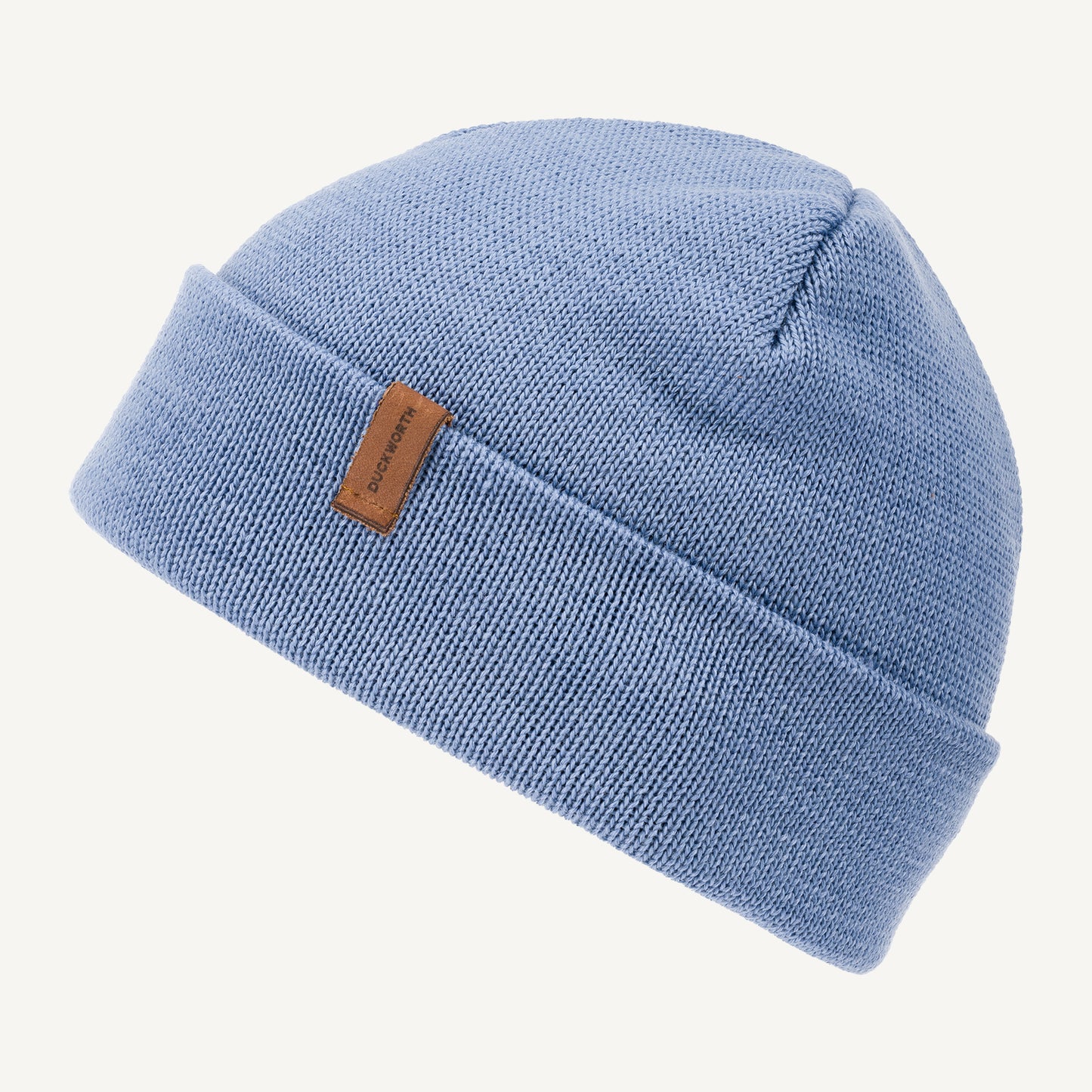 Blue made in America merino wool knit hat with leather patch. 