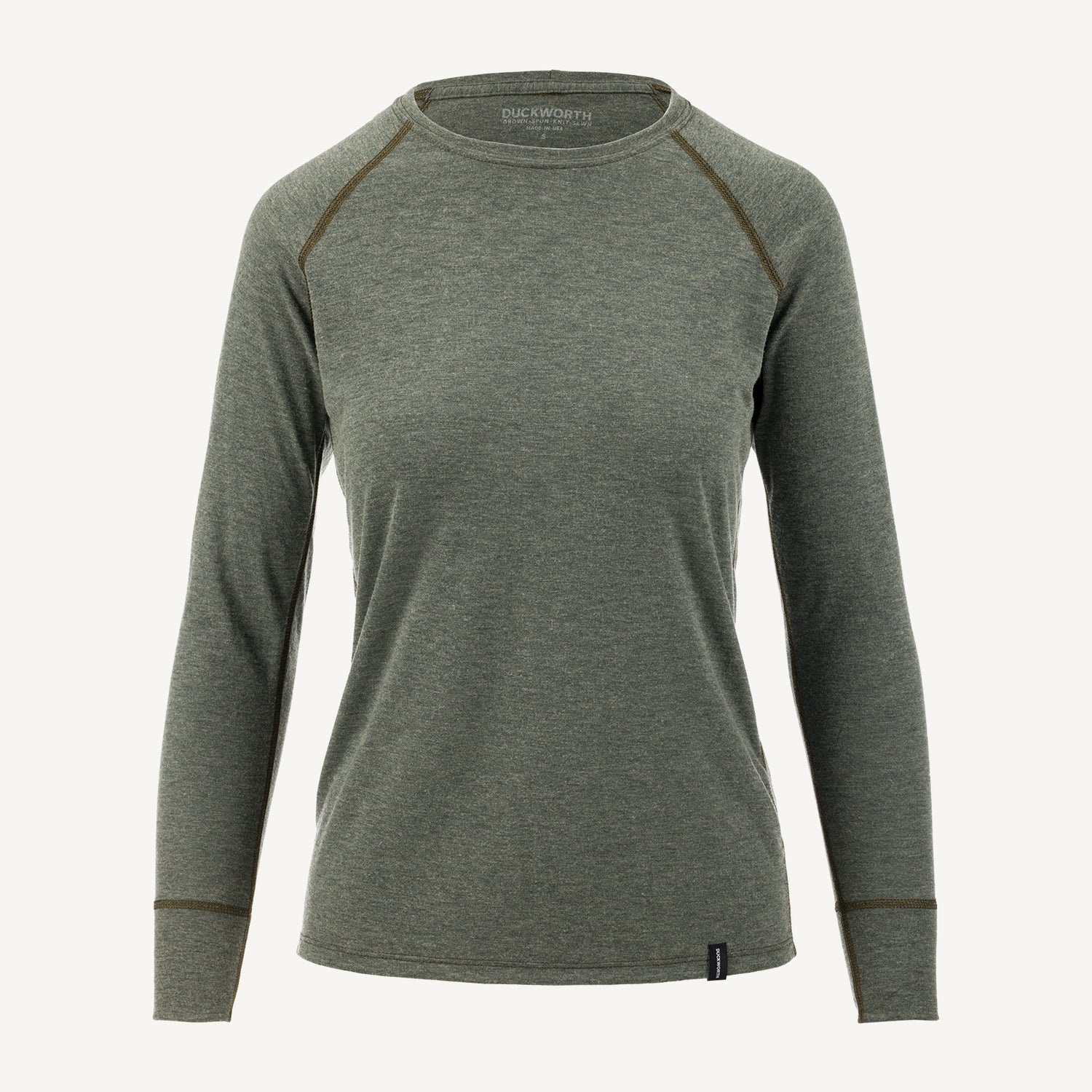 A green American made Duckworth merino wool lightweight long sleeve base layer. 