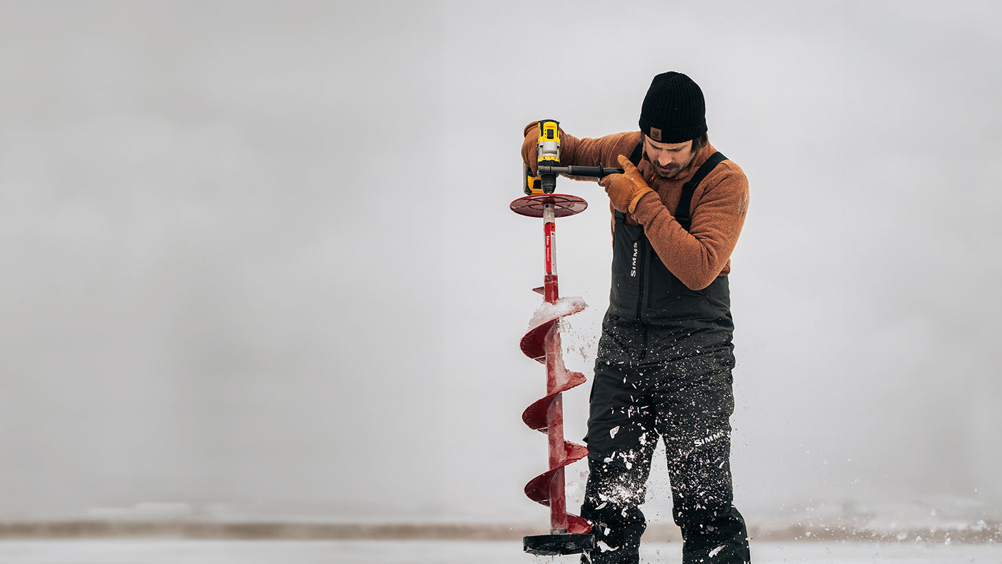 A man ice fishing in Montana