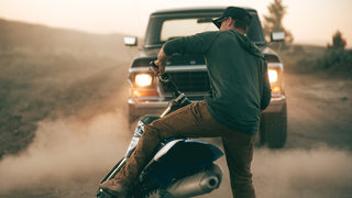 A man riding a motorcycle in Montana.