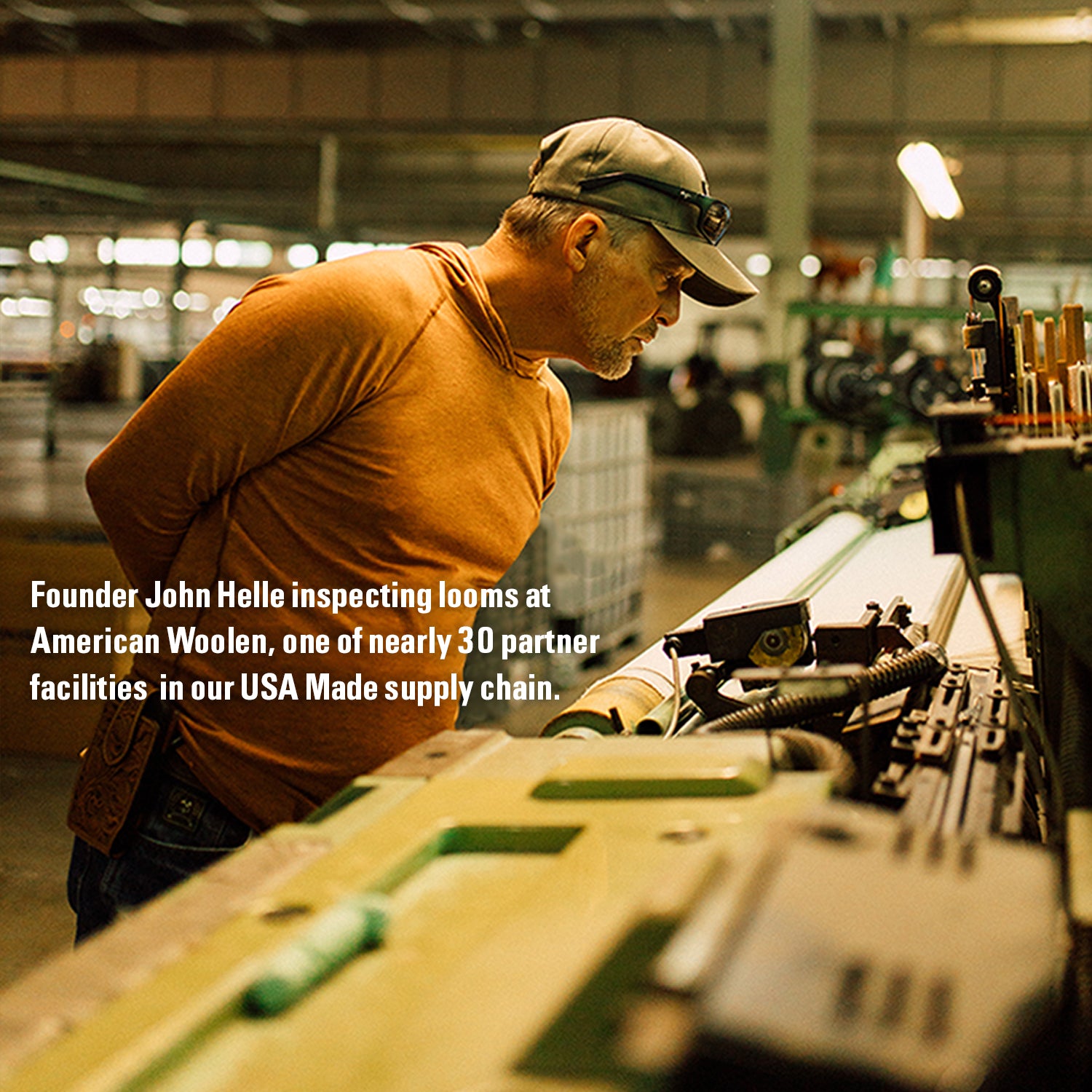 Duckworth founder inspecting fabric production.