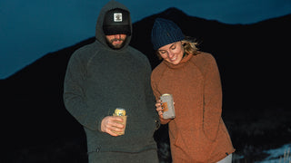 A couple bundled up in wool gear for the winter.